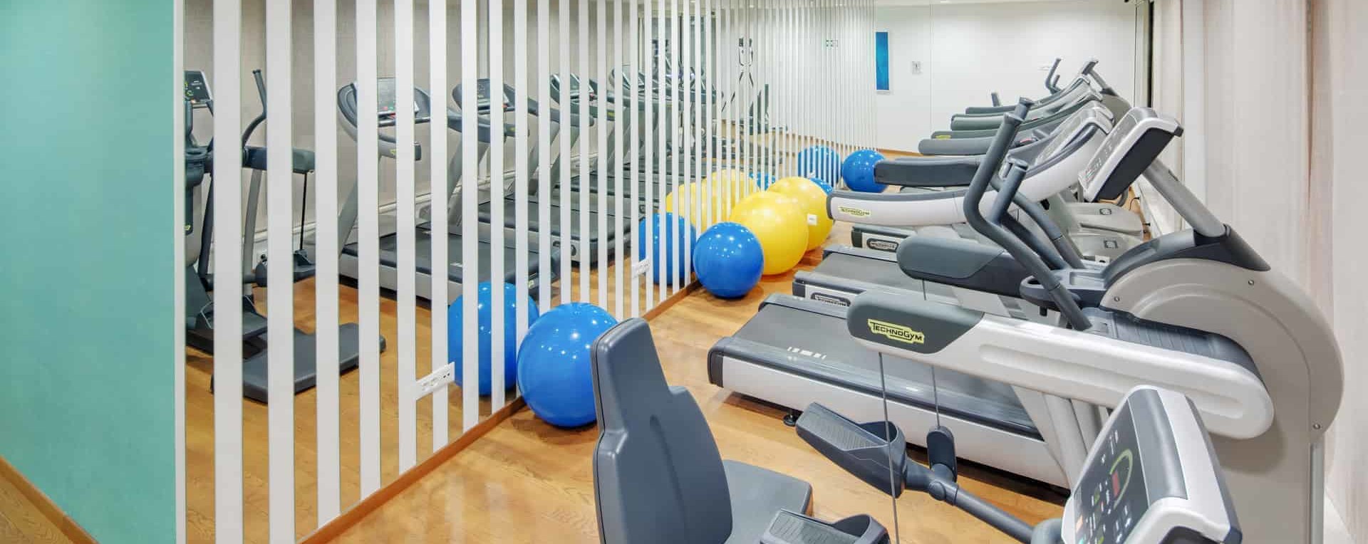 Hotel gym in Dioklecijan Hotel & Residence Split Croatia, working out on vacation, treadmill, exercise bike and pilates ball